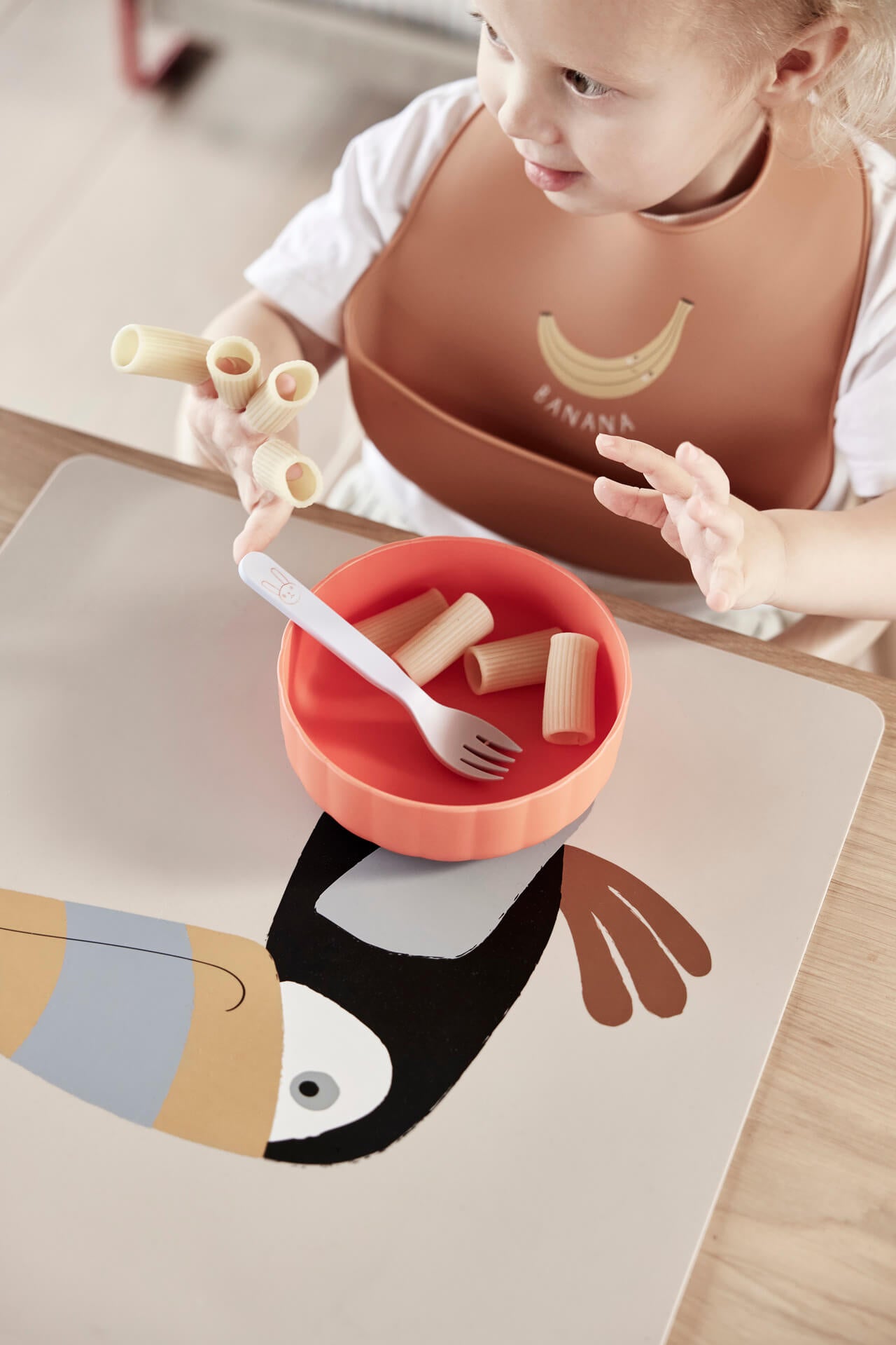 Set di 2 bavaglini in silicone 🥐🍌