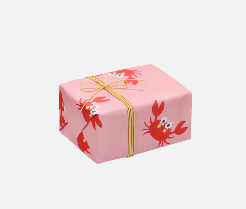 Wrapped up gift with crabs wrapping paper designed by Anne pascal